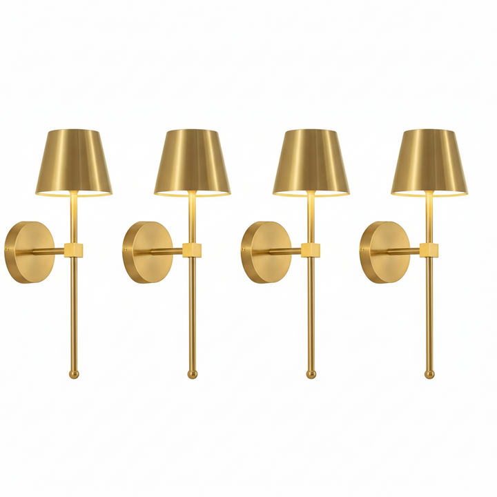 Four gold wall lights with lampshades on a white background