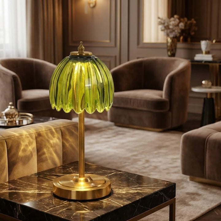 Stylish green glass cordless table lamp enhancing modern living room décor.